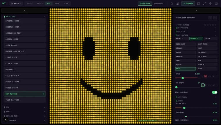 The GIF Matrix visualizer playing its HELMET 2 face preset to music — a glowing yellow LED-dot panel with a smiley face punched out in dark pixels, the Matrix LED category expanded in the left sidebar and live audio meters in the settings panel
