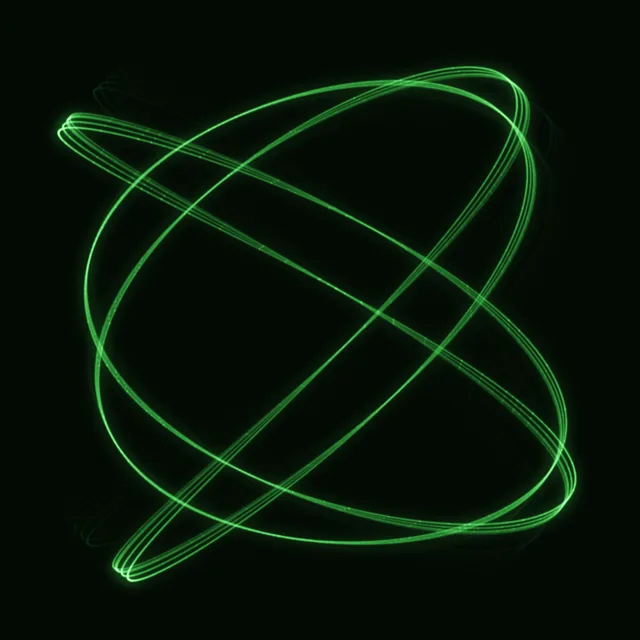 ROTATE: the Lissajous figure spinning clockwise with faint phosphor trails, Speed 0.52